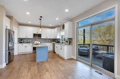This beautifully appointed 5-bedroom, 4-bathroom home, built in on Boulder Pointe Golf Club and Conference Center in Michigan - for sale on GolfHomes.com, golf home, golf lot