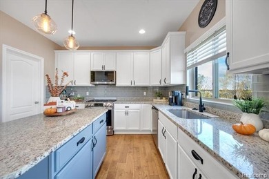 This beautifully appointed 5-bedroom, 4-bathroom home, built in on Boulder Pointe Golf Club and Conference Center in Michigan - for sale on GolfHomes.com, golf home, golf lot