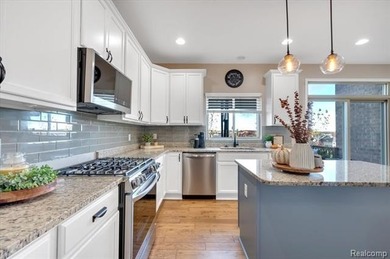 This beautifully appointed 5-bedroom, 4-bathroom home, built in on Boulder Pointe Golf Club and Conference Center in Michigan - for sale on GolfHomes.com, golf home, golf lot
