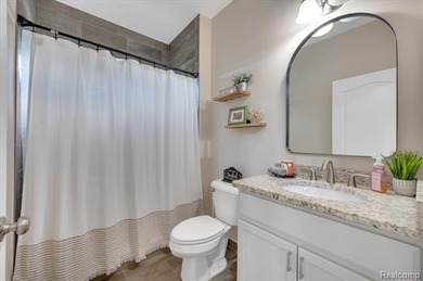 This beautifully appointed 5-bedroom, 4-bathroom home, built in on Boulder Pointe Golf Club and Conference Center in Michigan - for sale on GolfHomes.com, golf home, golf lot