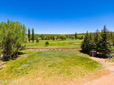 Welcome to your canvas of possibilities! This vacant parcel of on Pinewood Country Club in Arizona - for sale on GolfHomes.com, golf home, golf lot