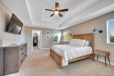 This beautifully appointed 5-bedroom, 4-bathroom home, built in on Boulder Pointe Golf Club and Conference Center in Michigan - for sale on GolfHomes.com, golf home, golf lot