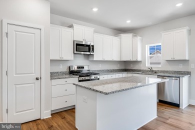 READY NOW!  END UNIT BAYLOR WITH DECK & 3RD BATHROOM!  Move in on Plantation Lakes Golf and Country Club in Delaware - for sale on GolfHomes.com, golf home, golf lot