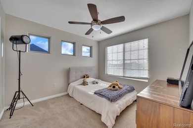 This beautifully appointed 5-bedroom, 4-bathroom home, built in on Boulder Pointe Golf Club and Conference Center in Michigan - for sale on GolfHomes.com, golf home, golf lot