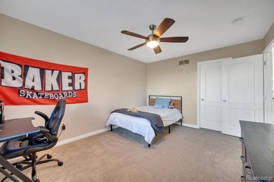 This beautifully appointed 5-bedroom, 4-bathroom home, built in on Boulder Pointe Golf Club and Conference Center in Michigan - for sale on GolfHomes.com, golf home, golf lot