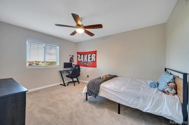 This beautifully appointed 5-bedroom, 4-bathroom home, built in on Boulder Pointe Golf Club and Conference Center in Michigan - for sale on GolfHomes.com, golf home, golf lot
