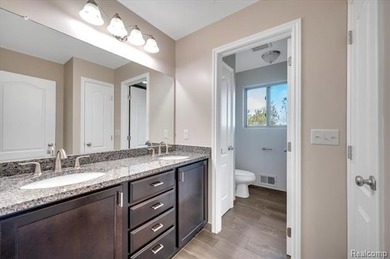 This beautifully appointed 5-bedroom, 4-bathroom home, built in on Boulder Pointe Golf Club and Conference Center in Michigan - for sale on GolfHomes.com, golf home, golf lot