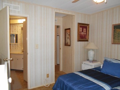 Rolling Greens Village is a friendly resort-style 55+ community on Rolling Greens Executive Golf Community in Florida - for sale on GolfHomes.com, golf home, golf lot