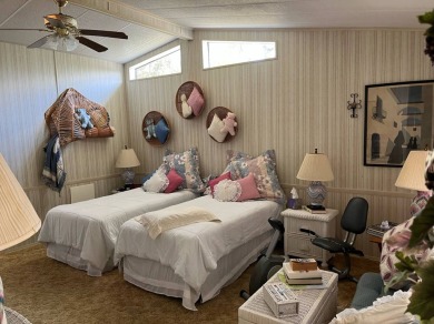 Rolling Greens Village is a friendly resort-style 55+ community on Rolling Greens Executive Golf Community in Florida - for sale on GolfHomes.com, golf home, golf lot