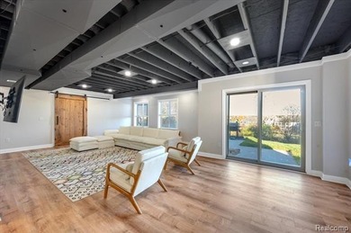 This beautifully appointed 5-bedroom, 4-bathroom home, built in on Boulder Pointe Golf Club and Conference Center in Michigan - for sale on GolfHomes.com, golf home, golf lot