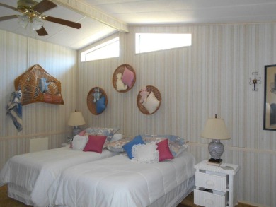 Rolling Greens Village is a friendly resort-style 55+ community on Rolling Greens Executive Golf Community in Florida - for sale on GolfHomes.com, golf home, golf lot