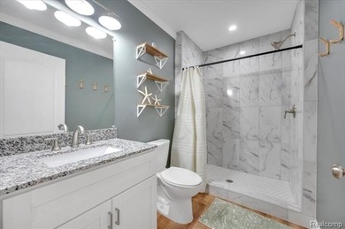 This beautifully appointed 5-bedroom, 4-bathroom home, built in on Boulder Pointe Golf Club and Conference Center in Michigan - for sale on GolfHomes.com, golf home, golf lot