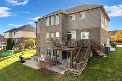 This beautifully appointed 5-bedroom, 4-bathroom home, built in on Boulder Pointe Golf Club and Conference Center in Michigan - for sale on GolfHomes.com, golf home, golf lot