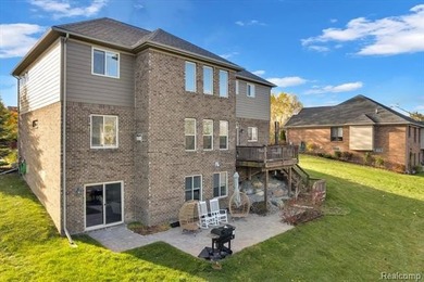 This beautifully appointed 5-bedroom, 4-bathroom home, built in on Boulder Pointe Golf Club and Conference Center in Michigan - for sale on GolfHomes.com, golf home, golf lot
