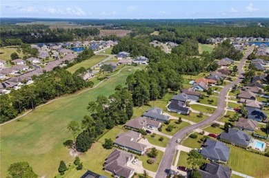 BEAUTIFUL 3-CAR GARAGE HOME IN FAIRWAYS EDGE ON THE 12TH FAIRWAY on Laurel Island Links in Georgia - for sale on GolfHomes.com, golf home, golf lot