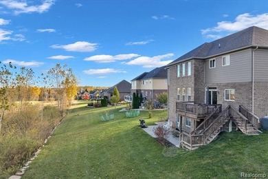 This beautifully appointed 5-bedroom, 4-bathroom home, built in on Boulder Pointe Golf Club and Conference Center in Michigan - for sale on GolfHomes.com, golf home, golf lot