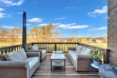 This beautifully appointed 5-bedroom, 4-bathroom home, built in on Boulder Pointe Golf Club and Conference Center in Michigan - for sale on GolfHomes.com, golf home, golf lot