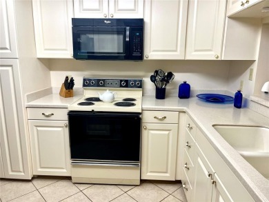 Tastefully decorated and being sold furnished, this meticulously on Tara Golf and Country Club in Florida - for sale on GolfHomes.com, golf home, golf lot