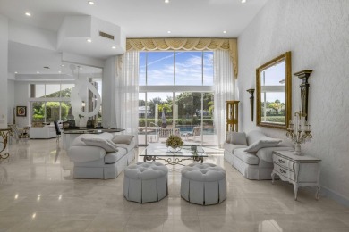 Enjoy sweeping lake and golf course views from this beautifully on Stonebridge Golf and Country Club in Florida - for sale on GolfHomes.com, golf home, golf lot