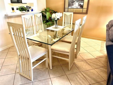 Tastefully decorated and being sold furnished, this meticulously on Tara Golf and Country Club in Florida - for sale on GolfHomes.com, golf home, golf lot