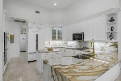Enjoy sweeping lake and golf course views from this beautifully on Stonebridge Golf and Country Club in Florida - for sale on GolfHomes.com, golf home, golf lot