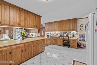 GRANDIOSE, CUSTOM BUILT HOME WITH LARGE SPACES THROUGHOUT ON on Brandywine Bay Golf Club in North Carolina - for sale on GolfHomes.com, golf home, golf lot