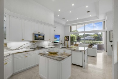 Enjoy sweeping lake and golf course views from this beautifully on Stonebridge Golf and Country Club in Florida - for sale on GolfHomes.com, golf home, golf lot