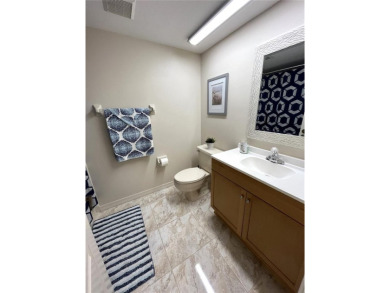 Tastefully decorated and being sold furnished, this meticulously on Tara Golf and Country Club in Florida - for sale on GolfHomes.com, golf home, golf lot