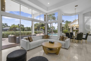 Enjoy sweeping lake and golf course views from this beautifully on Stonebridge Golf and Country Club in Florida - for sale on GolfHomes.com, golf home, golf lot