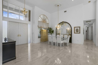 Enjoy sweeping lake and golf course views from this beautifully on Stonebridge Golf and Country Club in Florida - for sale on GolfHomes.com, golf home, golf lot