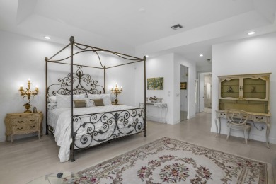Enjoy sweeping lake and golf course views from this beautifully on Stonebridge Golf and Country Club in Florida - for sale on GolfHomes.com, golf home, golf lot