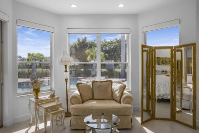Enjoy sweeping lake and golf course views from this beautifully on Stonebridge Golf and Country Club in Florida - for sale on GolfHomes.com, golf home, golf lot