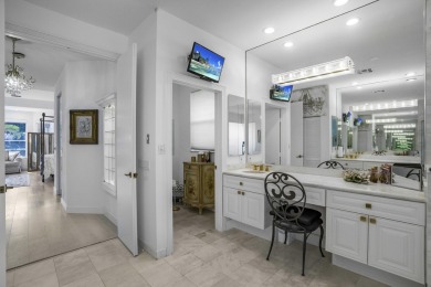 Enjoy sweeping lake and golf course views from this beautifully on Stonebridge Golf and Country Club in Florida - for sale on GolfHomes.com, golf home, golf lot