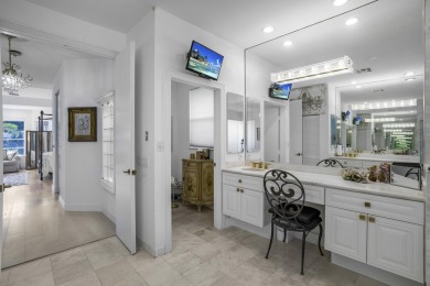 Enjoy sweeping lake and golf course views from this beautifully on Stonebridge Golf and Country Club in Florida - for sale on GolfHomes.com, golf home, golf lot