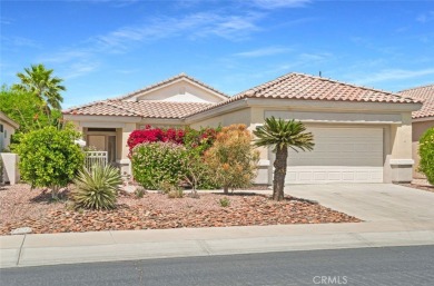 Tucked within the heart of Sun City Palm Desert, a highly on Mountain Vista Golf Course At Sun City Palm Desert in California - for sale on GolfHomes.com, golf home, golf lot