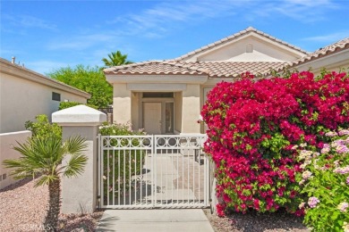 Tucked within the heart of Sun City Palm Desert, a highly on Mountain Vista Golf Course At Sun City Palm Desert in California - for sale on GolfHomes.com, golf home, golf lot