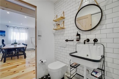 This beautiful home has been completely renovated down to the on Pocono Farms Country Club in Pennsylvania - for sale on GolfHomes.com, golf home, golf lot