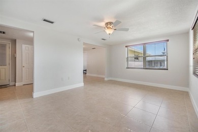 One or more photo(s) has been virtually staged. Priced to sell on Gulf Harbors Golf Course in Florida - for sale on GolfHomes.com, golf home, golf lot