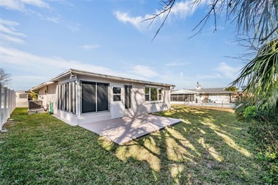 One or more photo(s) has been virtually staged. Priced to sell on Gulf Harbors Golf Course in Florida - for sale on GolfHomes.com, golf home, golf lot