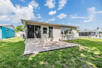 One or more photo(s) has been virtually staged. Priced to sell on Gulf Harbors Golf Course in Florida - for sale on GolfHomes.com, golf home, golf lot