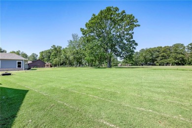 Stunning one level home on the Highlands golf course. The 17th on Bella Vista Country Club - Highlands in Arkansas - for sale on GolfHomes.com, golf home, golf lot