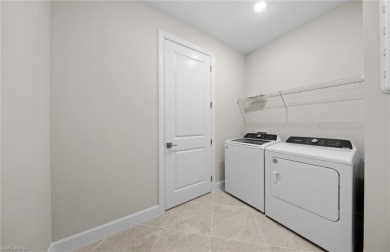 Experience the perfect blend of luxury and comfort in this on River Hall Country Club in Florida - for sale on GolfHomes.com, golf home, golf lot