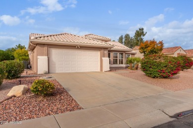 Pride of ownership! This charming 2-bedroom, 2-bath residence is on Desert Trails in Arizona - for sale on GolfHomes.com, golf home, golf lot