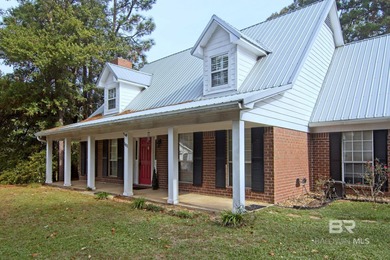 Spacious Lake Forest gem! This 4-bedroom, 2.5-bath home offers on Lake Forest Yacht and Country Club in Alabama - for sale on GolfHomes.com, golf home, golf lot