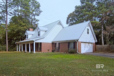 Spacious Lake Forest gem! This 4-bedroom, 2.5-bath home offers on Lake Forest Yacht and Country Club in Alabama - for sale on GolfHomes.com, golf home, golf lot
