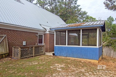 Spacious Lake Forest gem! This 4-bedroom, 2.5-bath home offers on Lake Forest Yacht and Country Club in Alabama - for sale on GolfHomes.com, golf home, golf lot