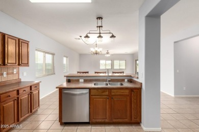 Discover the perfect blend of comfort, space, and resort-style on The Golf Club At Johnson Ranch in Arizona - for sale on GolfHomes.com, golf home, golf lot