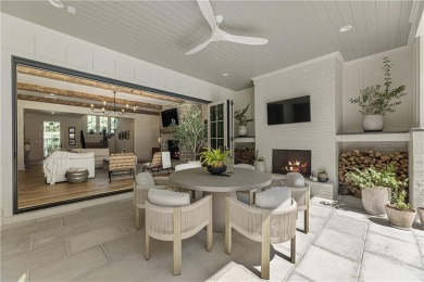 The epitome of right-sized luxury living awaits in this on Hawks Ridge Golf Club in Georgia - for sale on GolfHomes.com, golf home, golf lot