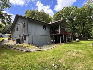 A great location overlooking the South Fork River next to the on Cherokee Village North Course in Arkansas - for sale on GolfHomes.com, golf home, golf lot