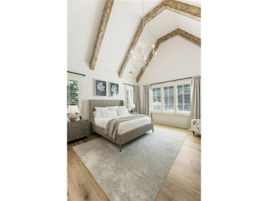 The epitome of right-sized luxury living awaits in this on Hawks Ridge Golf Club in Georgia - for sale on GolfHomes.com, golf home, golf lot